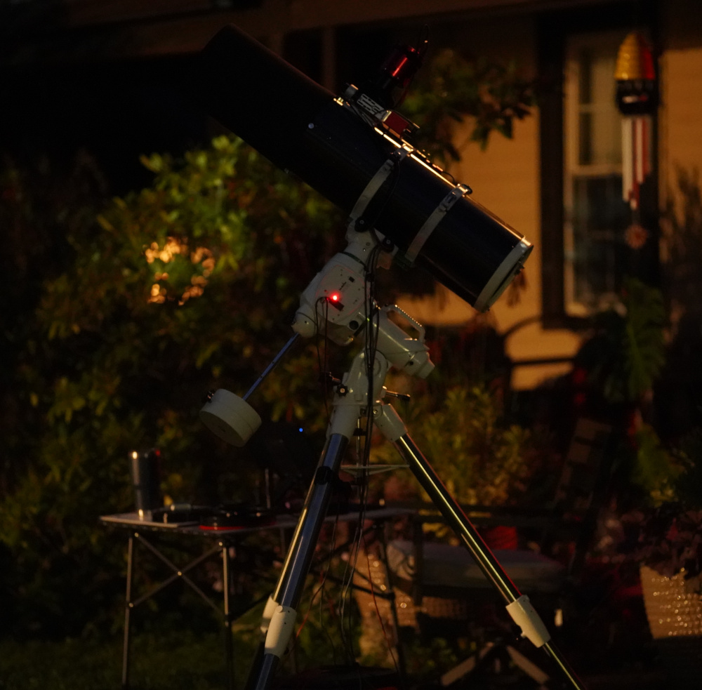 With the ASI2600MC-Pro and custom lens hood from cosplay foam and (later) black flocking tape.