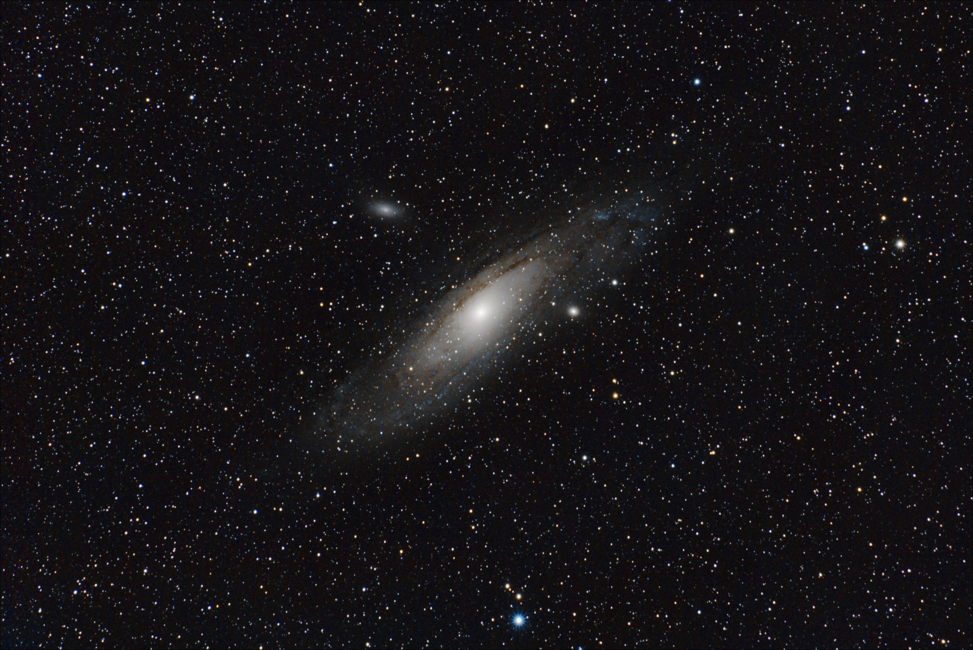 M31 from November 2, 2023 &ndash; $120 \times 30 \mathrm{sec}$ exposures (1h total) with my Sony α7C using a 300mm lens at F/9 on a Star Adventurer 2i mount. Processed with Siril.