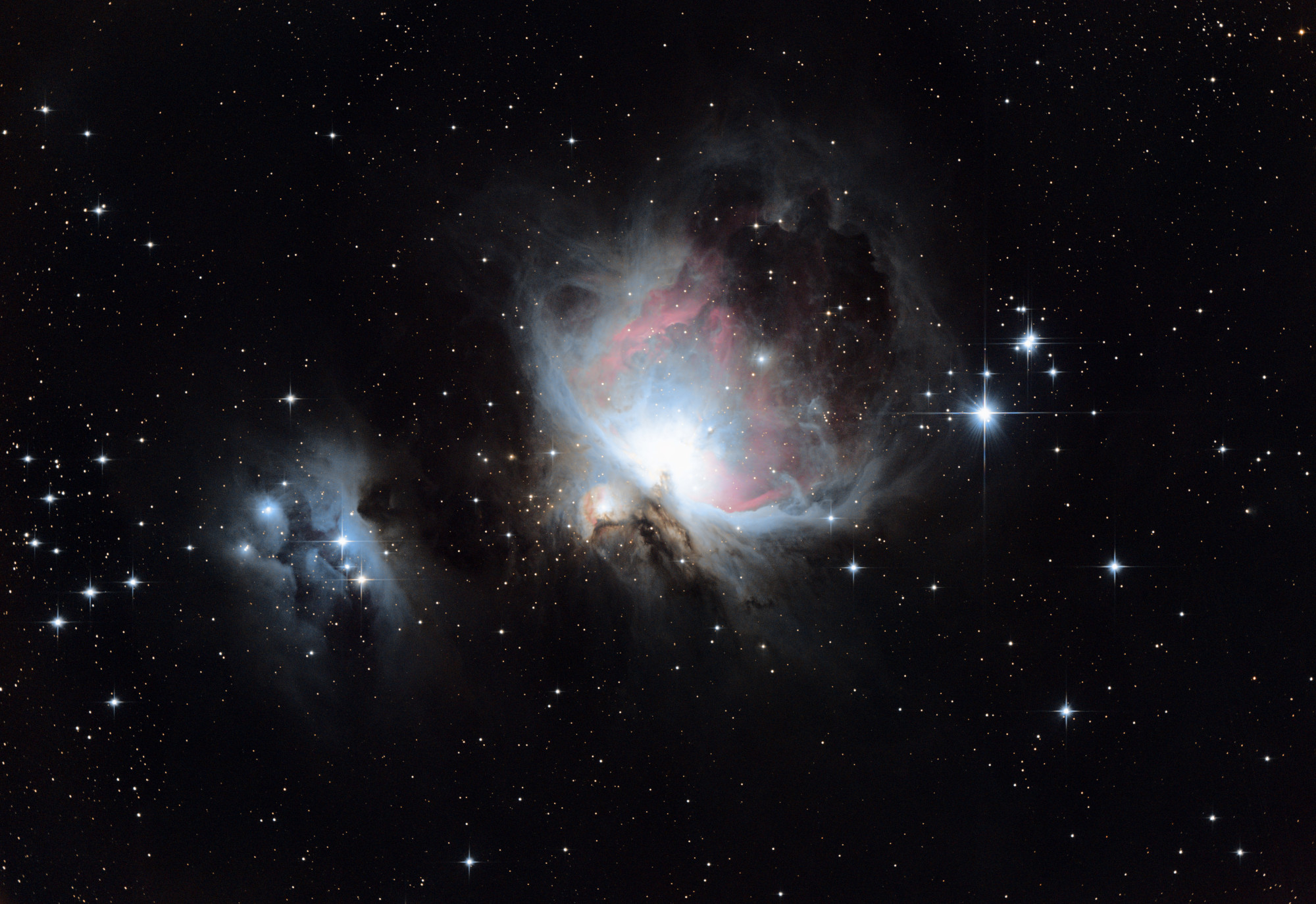 M42 &amp; NGC1977 from December 12, 2023 &ndash; $35 \times 2 \mathrm{min}$ exposures (1h10m total) with the α7C. Acquired with NINA and PHD2. Processed with Siril. Click for full resolution.