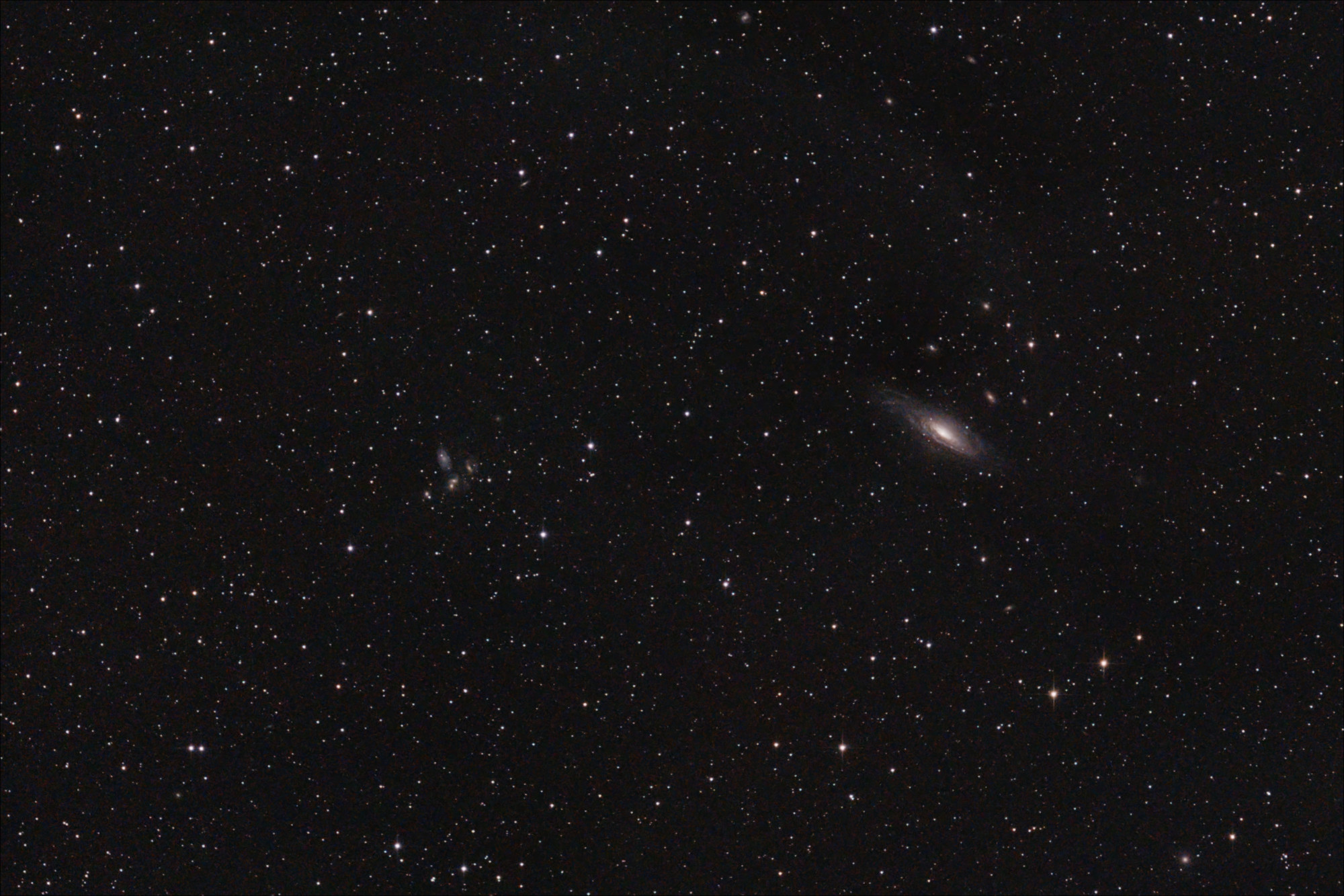 NGC 7331 (the largest galaxy) and friends from August 22, 2024 &ndash; $11 \times 4 \mathrm{min}$ exposures (44m total) with the α7C. Acquired with INDI + KStars/Ekos. Processed with Siril especially for this post. This was a brutally short exposure, but the target went behind a tree. Noise reduction carried the day here.