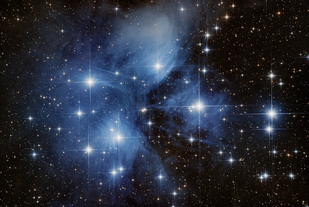 First data I took with my telescope, using a Sony α7C. Processed with GraXpert. Pure reflection of the bright blue sisters off local dust.