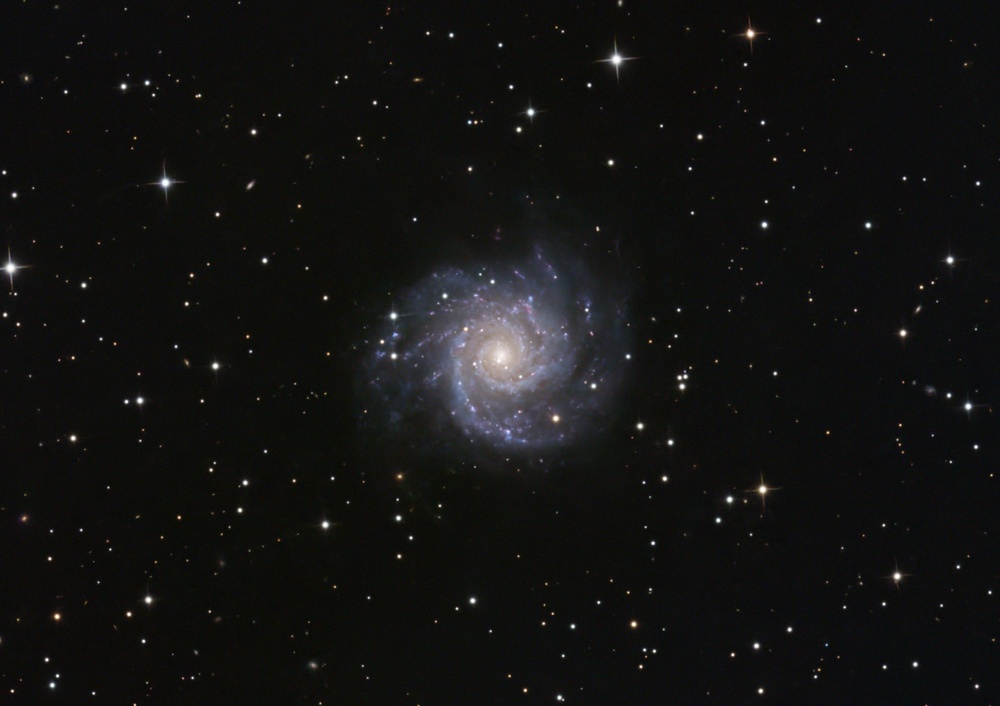 3h14m (97 x 2min) Broadband. Processed with NoiseX and BlurX. Cropped. Another very dim galaxy, this time from being behind our own galaxy.